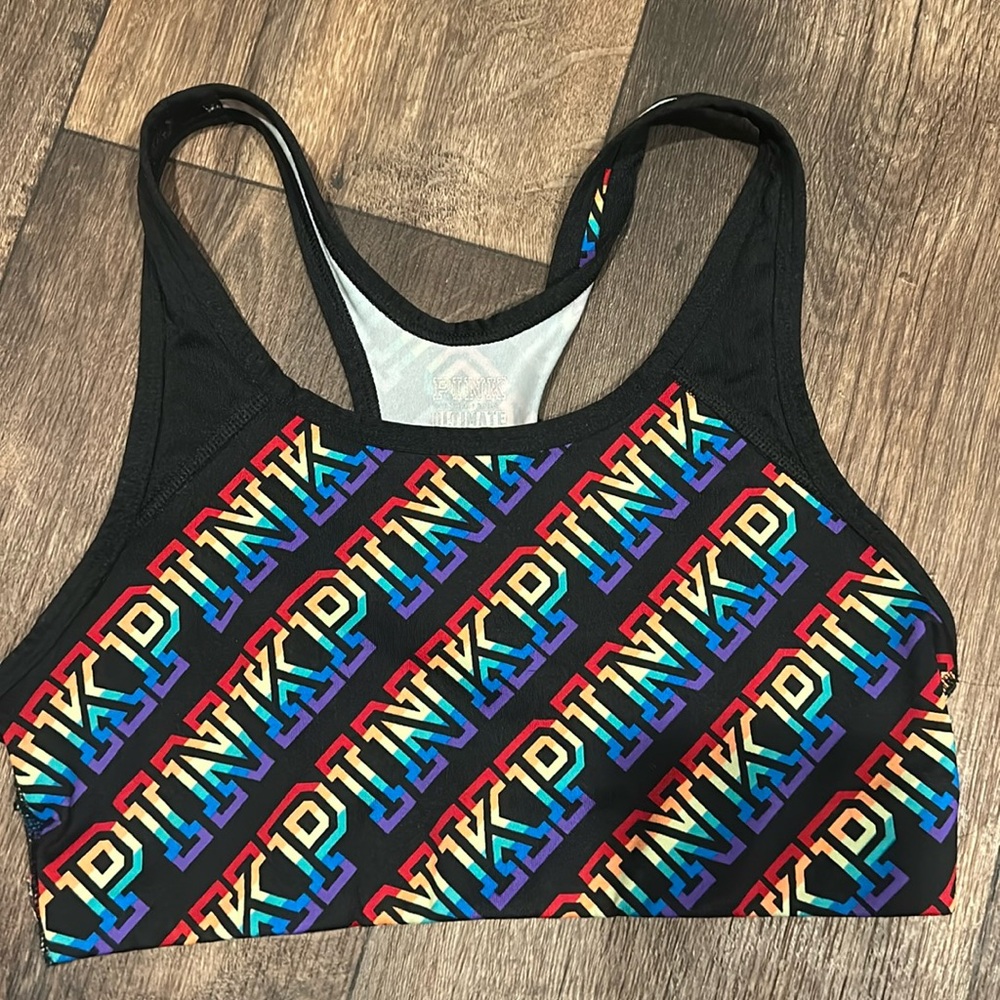 Pink rainbow very good condition sports bra